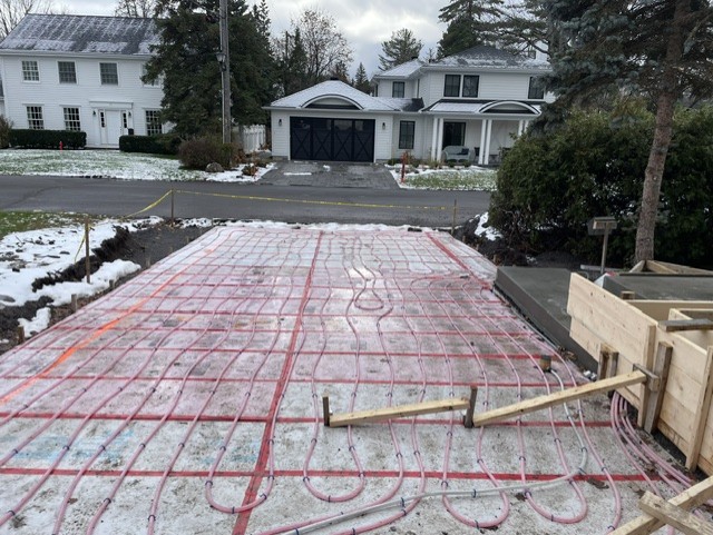 Residential driveway with hydronic snow melt installed.