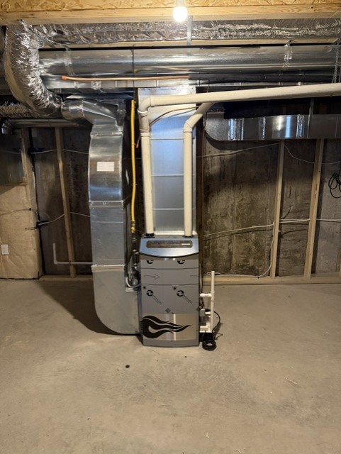 Furnace and ductwork installation in a new home build.